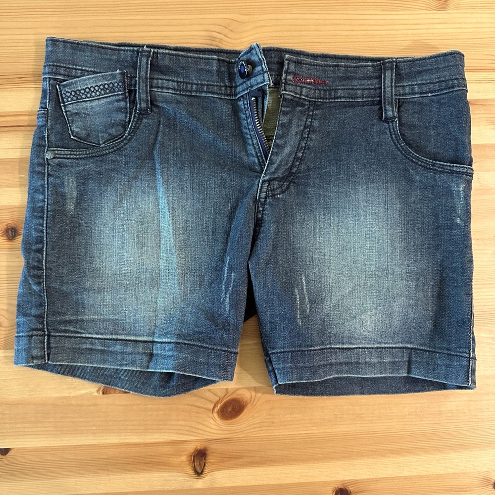 Light distressed denim shorts